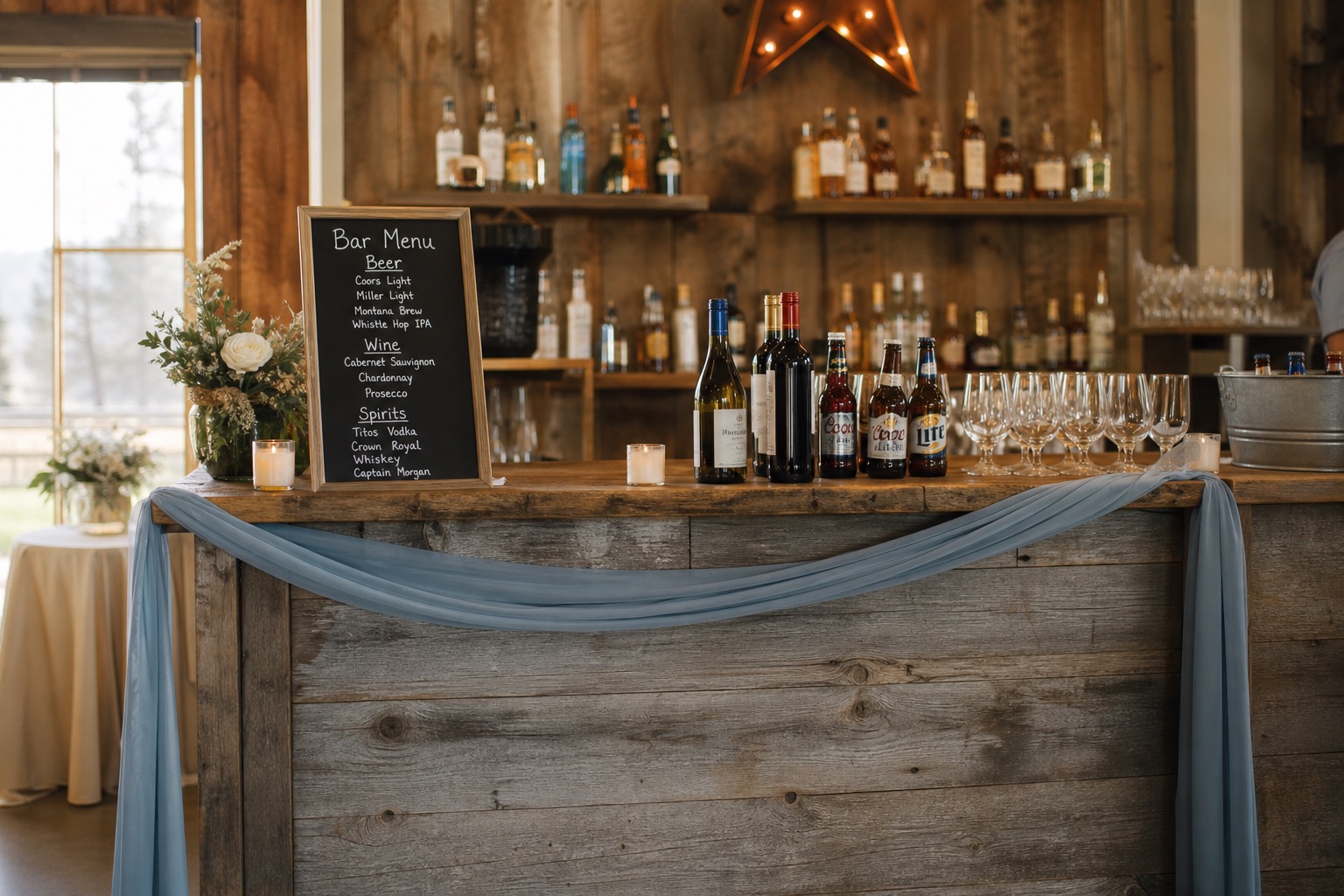 Rustic Montana wedding bar with wood finish and bottles ready for service.